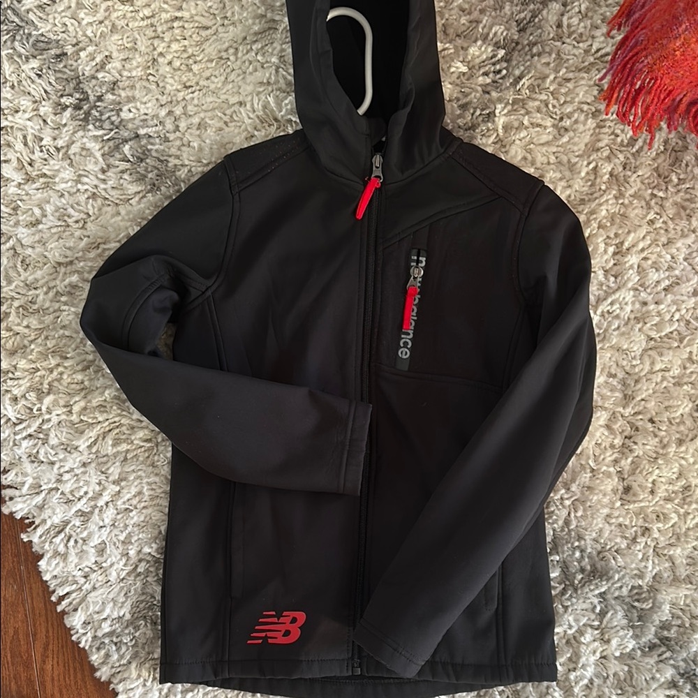 Boys size 8 New Balance Black Hooded Jacket with red detail